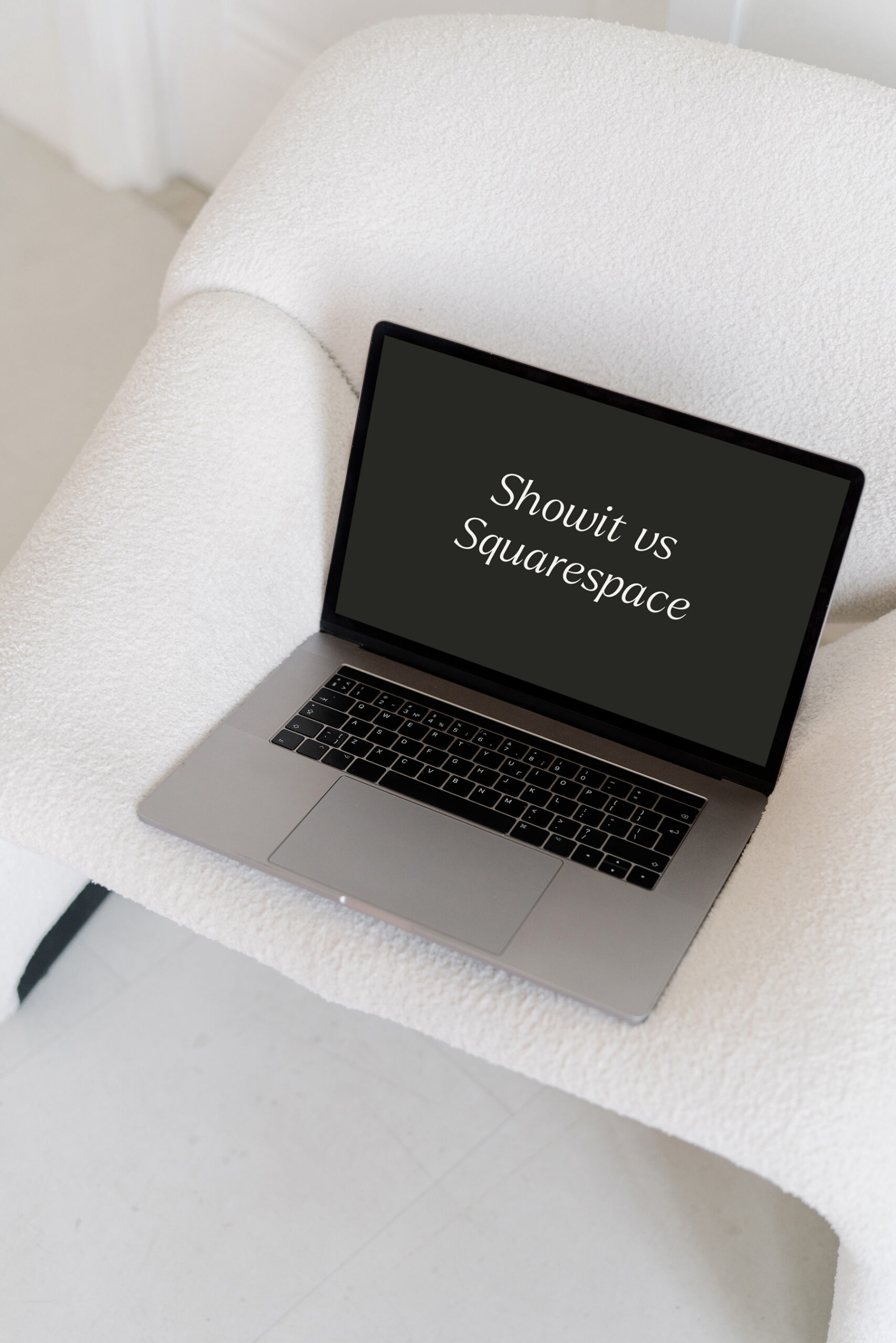 Laptop mockup with text “Showit vs Squarespace” for a website builder comparison for photographers and creatives